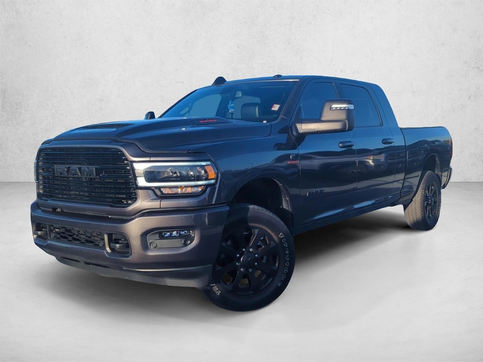 2023 RAM 3500 Laramie 4x4 Mega Cab 6'4" Box in Granite Crystal Metallic Clearcoat — front three-quarter view